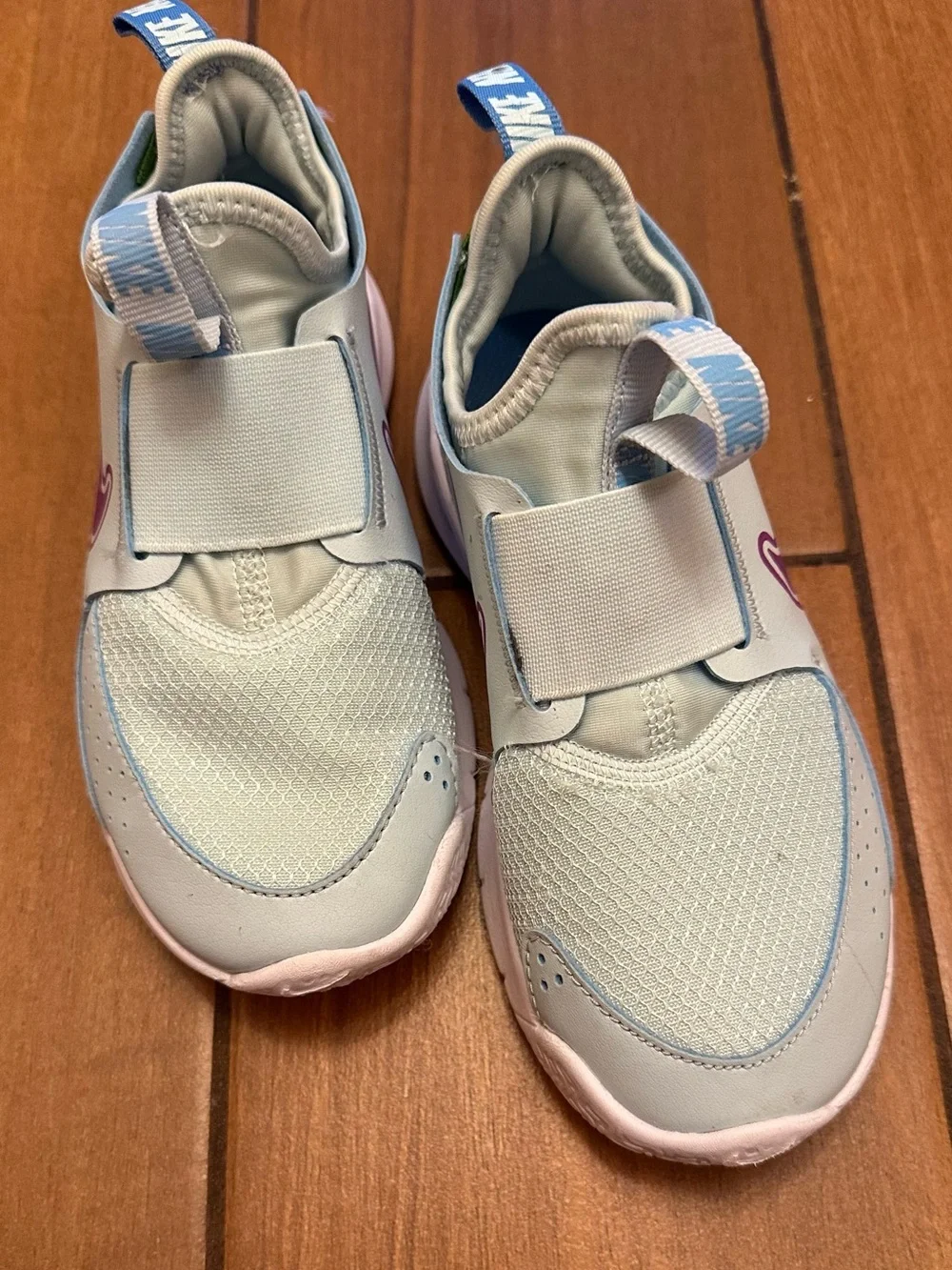 Nike Kids Mint Green Slip-On Sneakers with Purple Swoosh